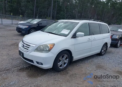2010 Honda Odyssey Touring from USA, damaged, VIN 5FNRL3H9XAB005406